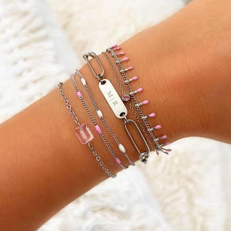 Zilveren armband met roze bolletjes 