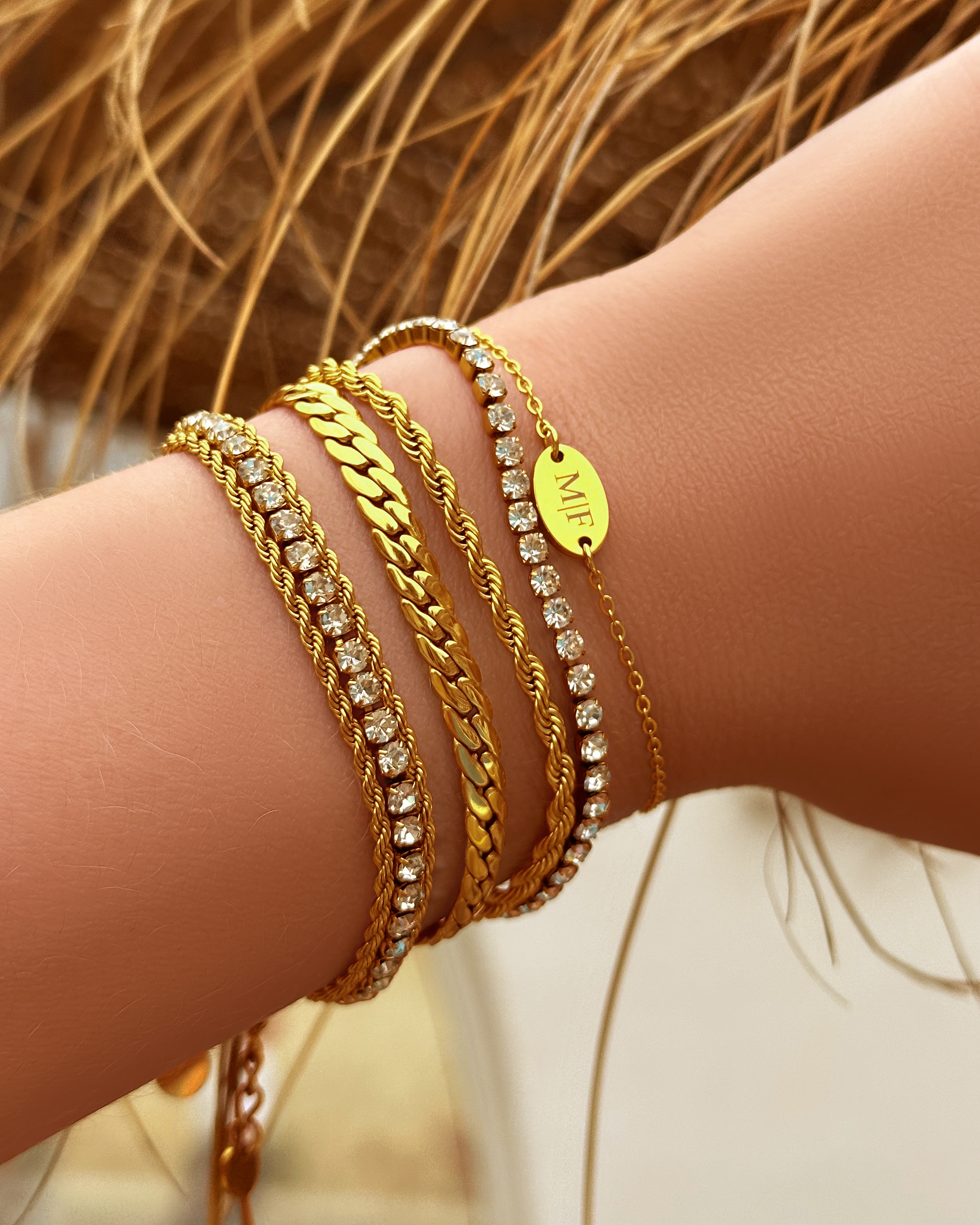 Gouden armbanden mix