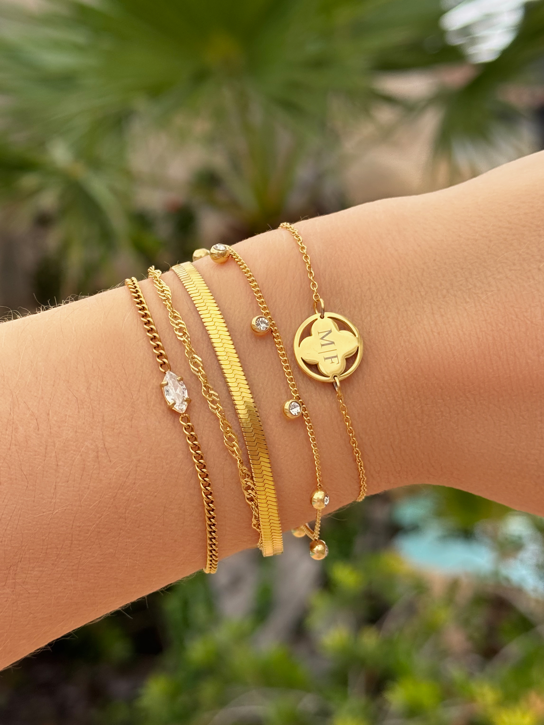 Gouden armparty met sparkles