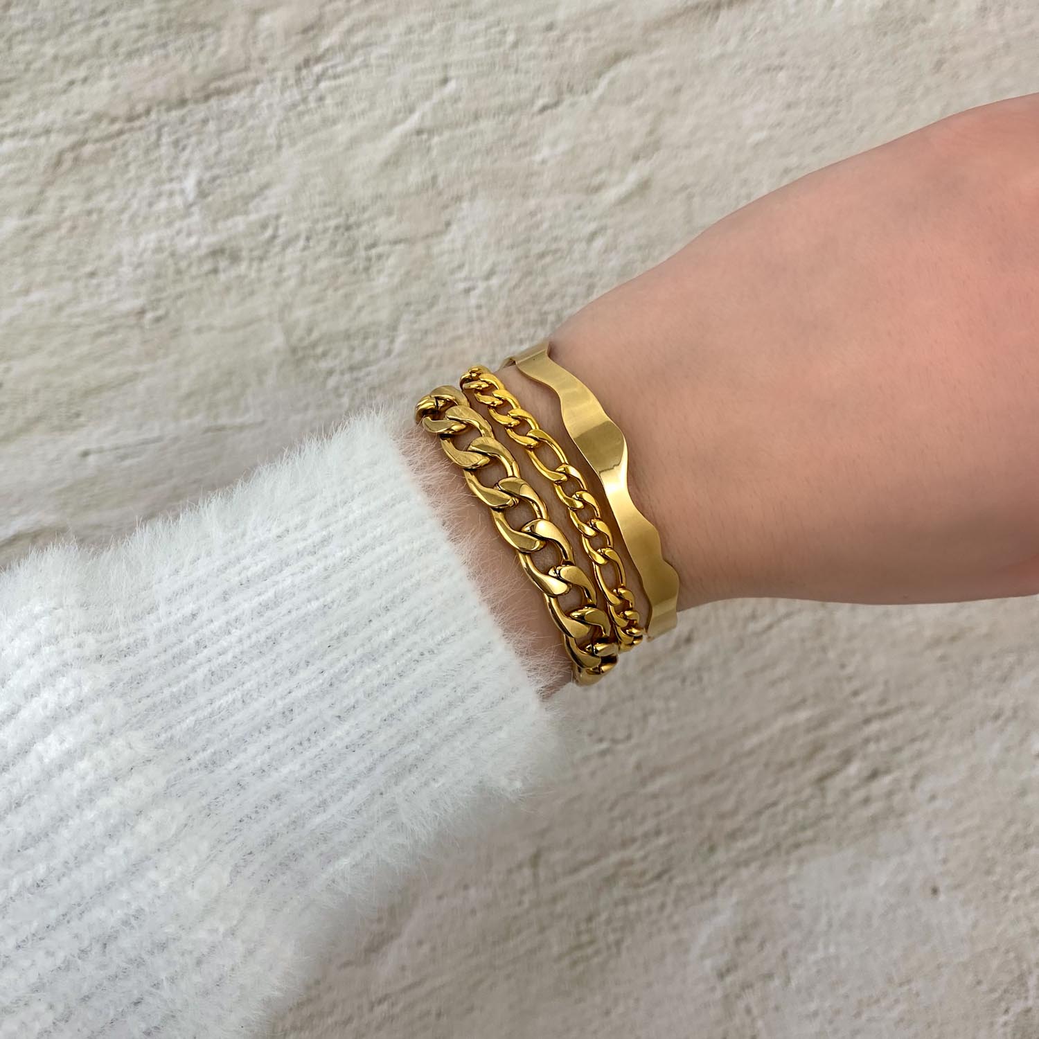 Armparty met mixed chain armbandje goud