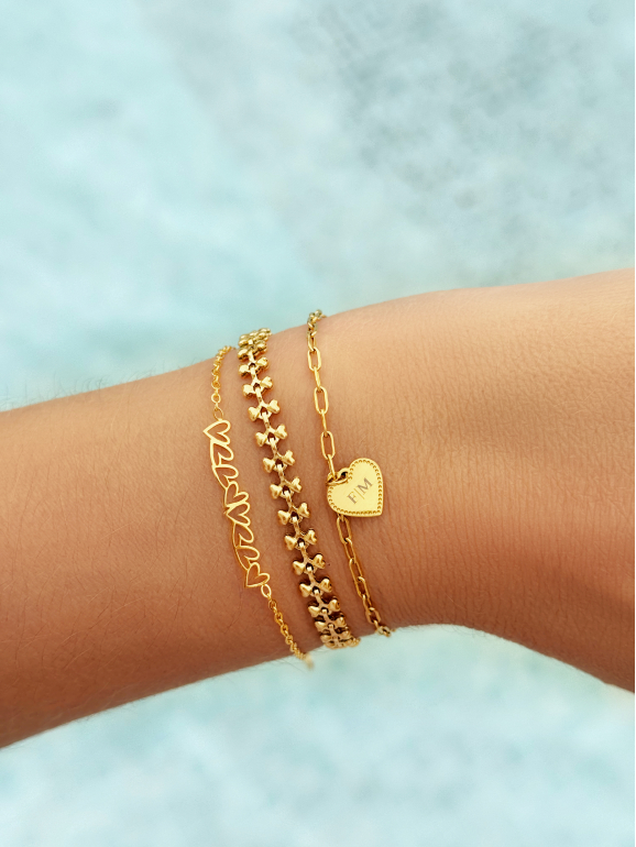 Gouden armbanden met hartjes