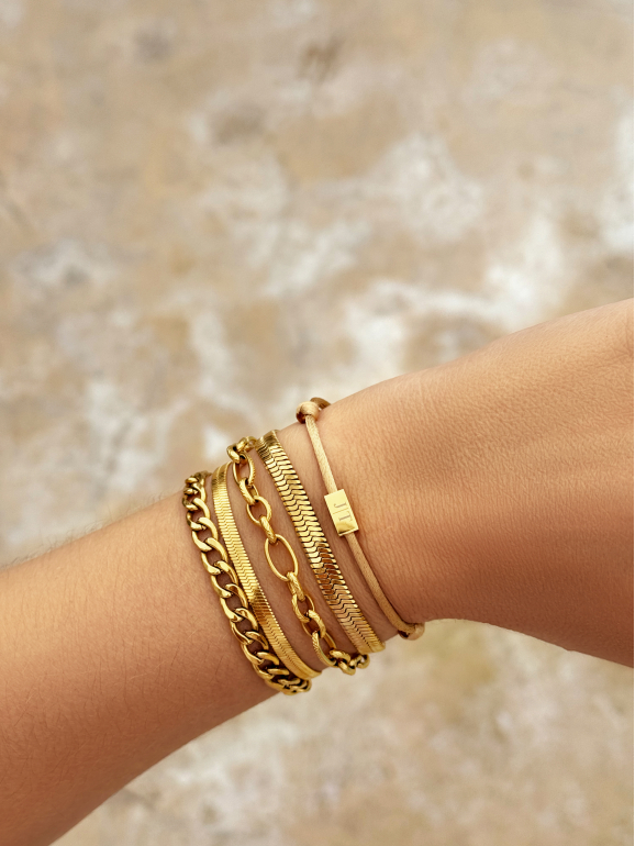 Gouden armparty met chain armbanden