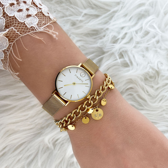 Gouden armbanden met horloge