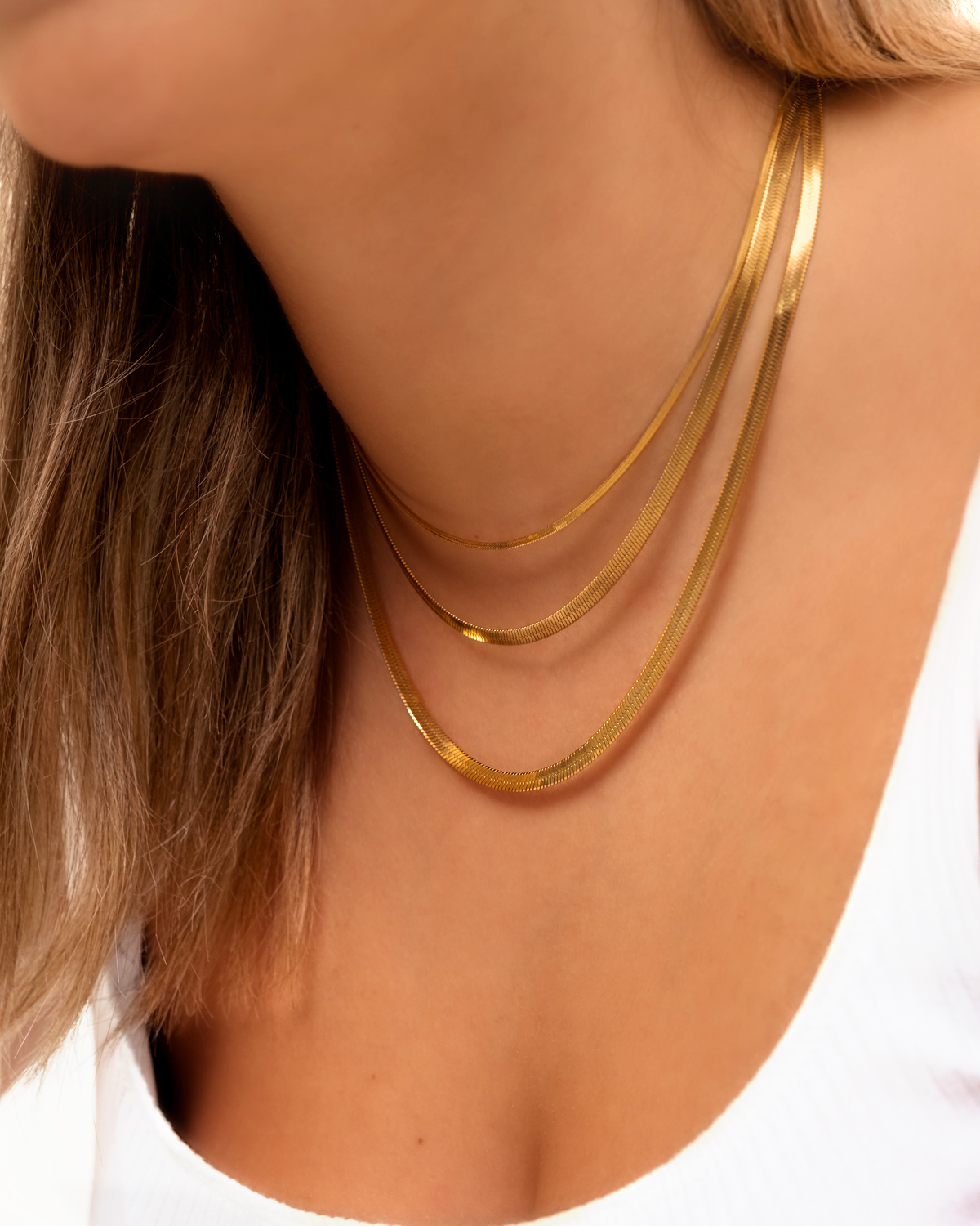 Gouden necklaceparty met snake kettingen