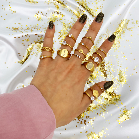 Graveerbare minimalistische ring met muntje goud kleurig