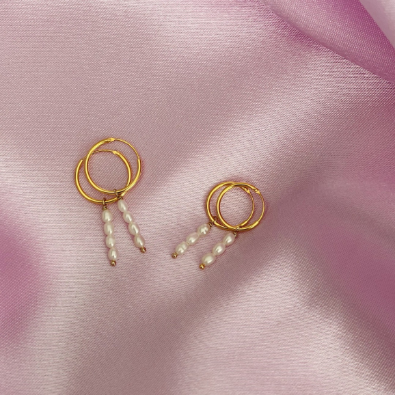 Gouden oorringetjes met verschillende parels