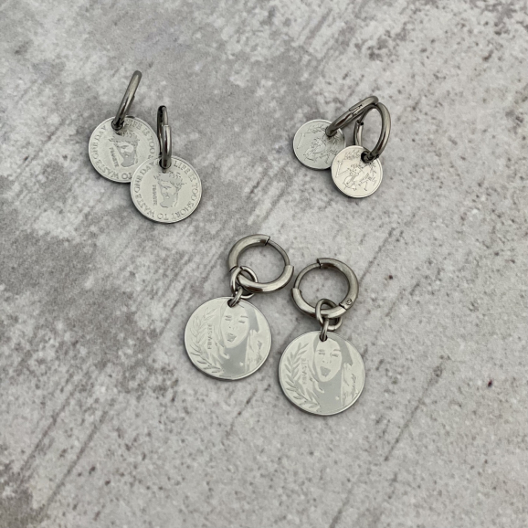 Zilveren oorbellen met coins shoppen