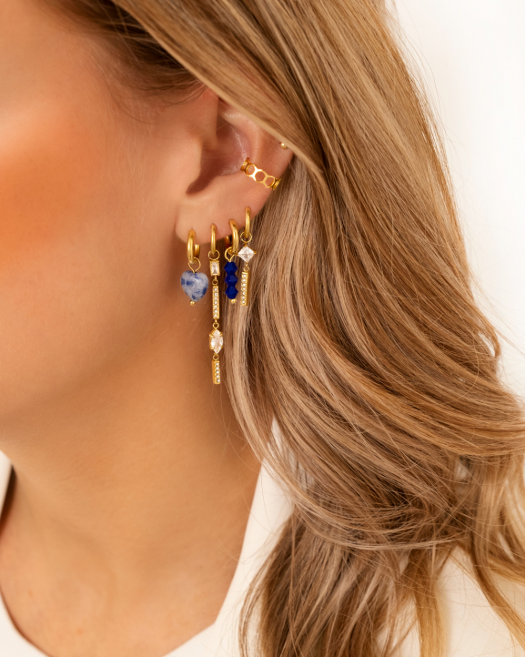 Gouden earparty met blauwe steentjes