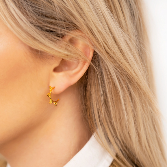 Gouden oorbellen met details