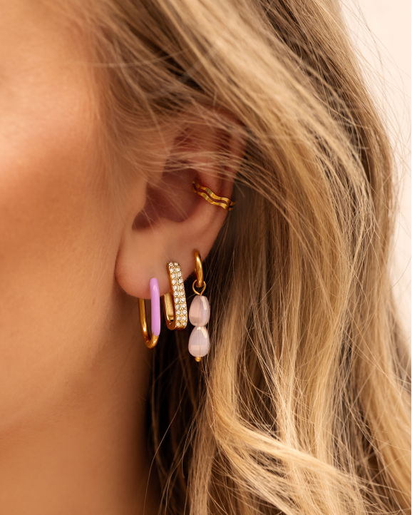 Gouden earparty met lila details