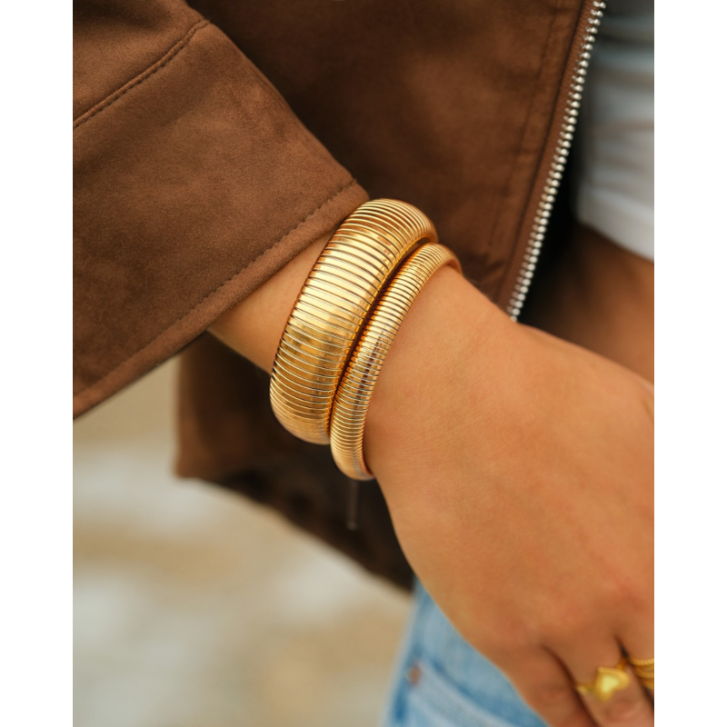 Statement bangle met stretch goudkleurig