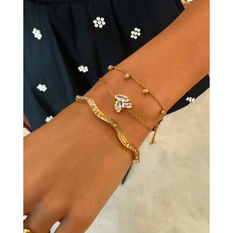 Gouden armparty met steentjes