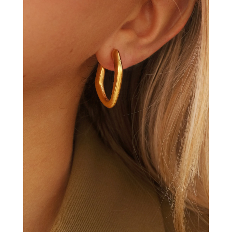Organic curve oorbellen goudkleurig