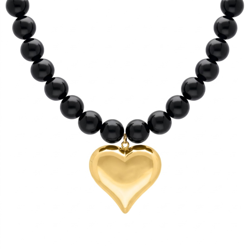 Zwarte kralen ketting met hart goudkleurig