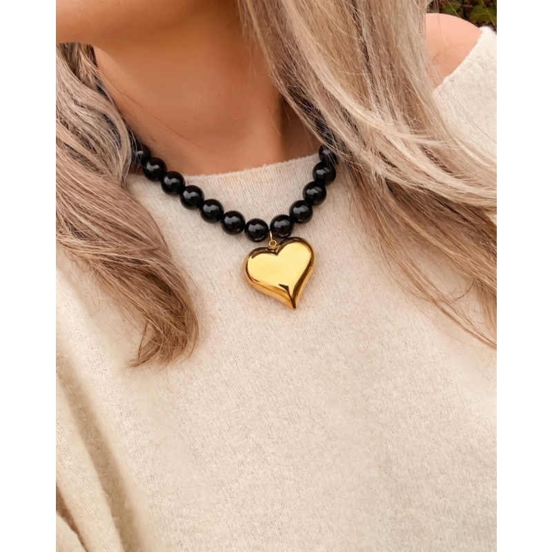 Zwarte kralen ketting met hart goudkleurig