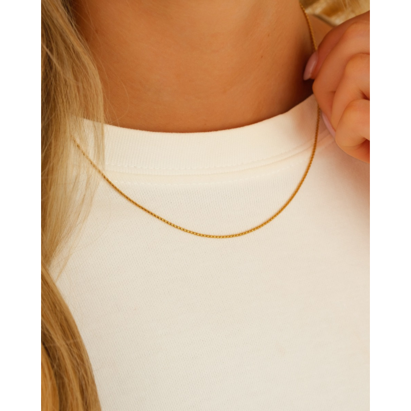 Minimalistische ketting twist goudkleurig