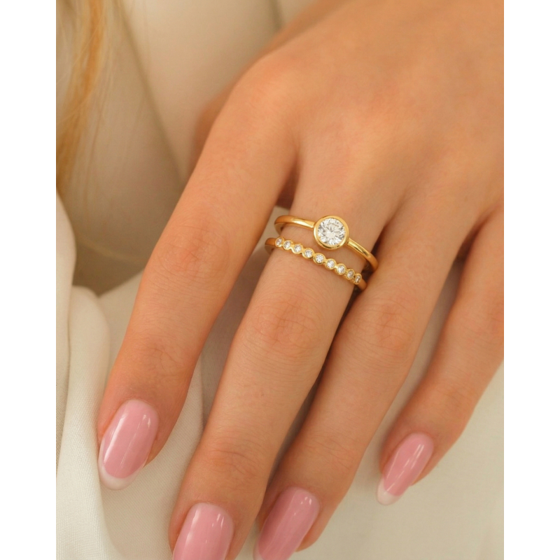 Dubbele ring met steentjes goudkleurig