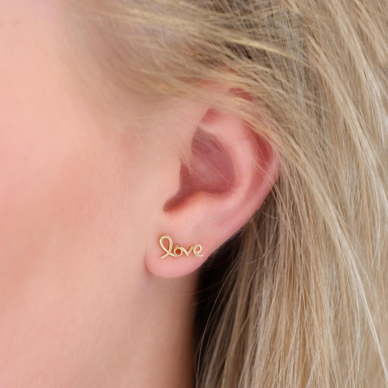 Love oorbellen goud kleurig
