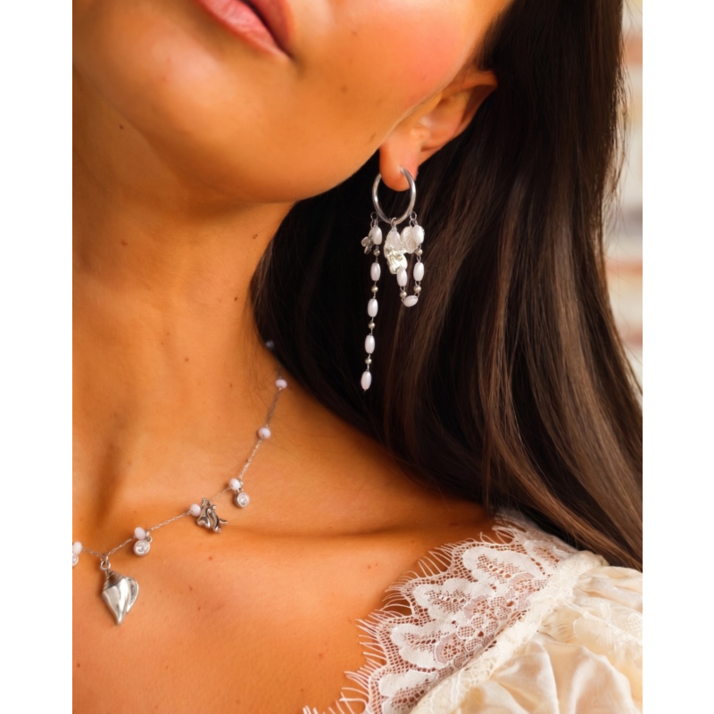 Multi pearl oorbellen met bedeltjes