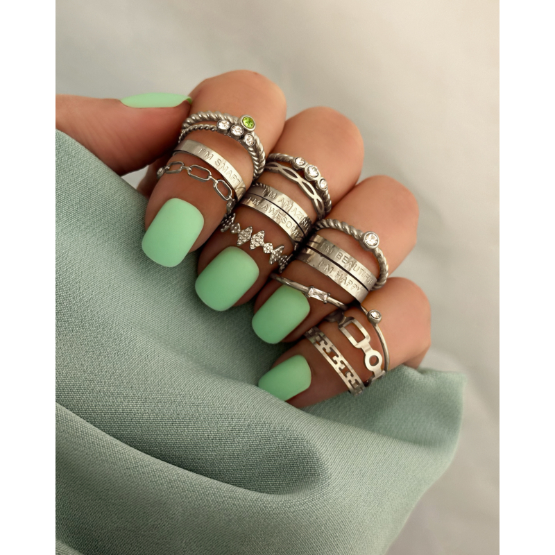 Gedraaide ring met 3 steentjes
