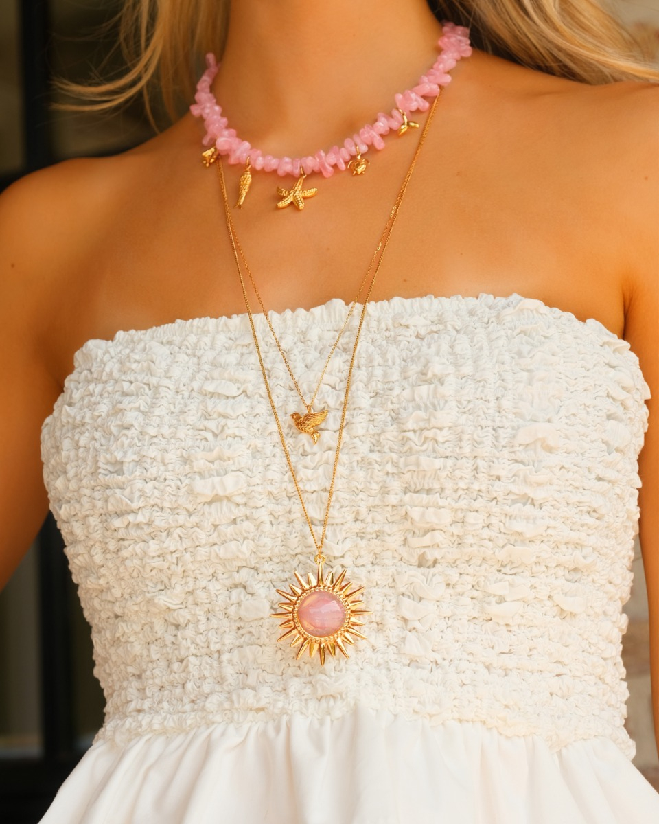 gouden necklace layer met roze kettingen