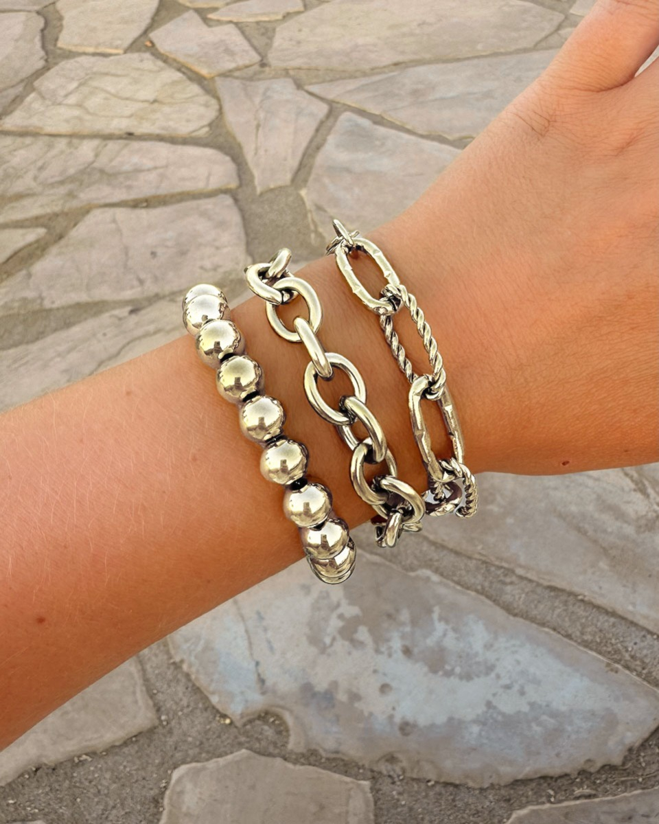 Zilveren schakelarmbanden armparty