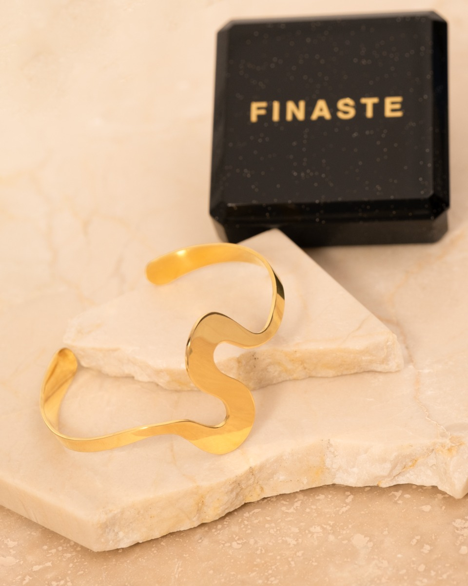 Swirl bangle goudkleurig met sieradendoosje