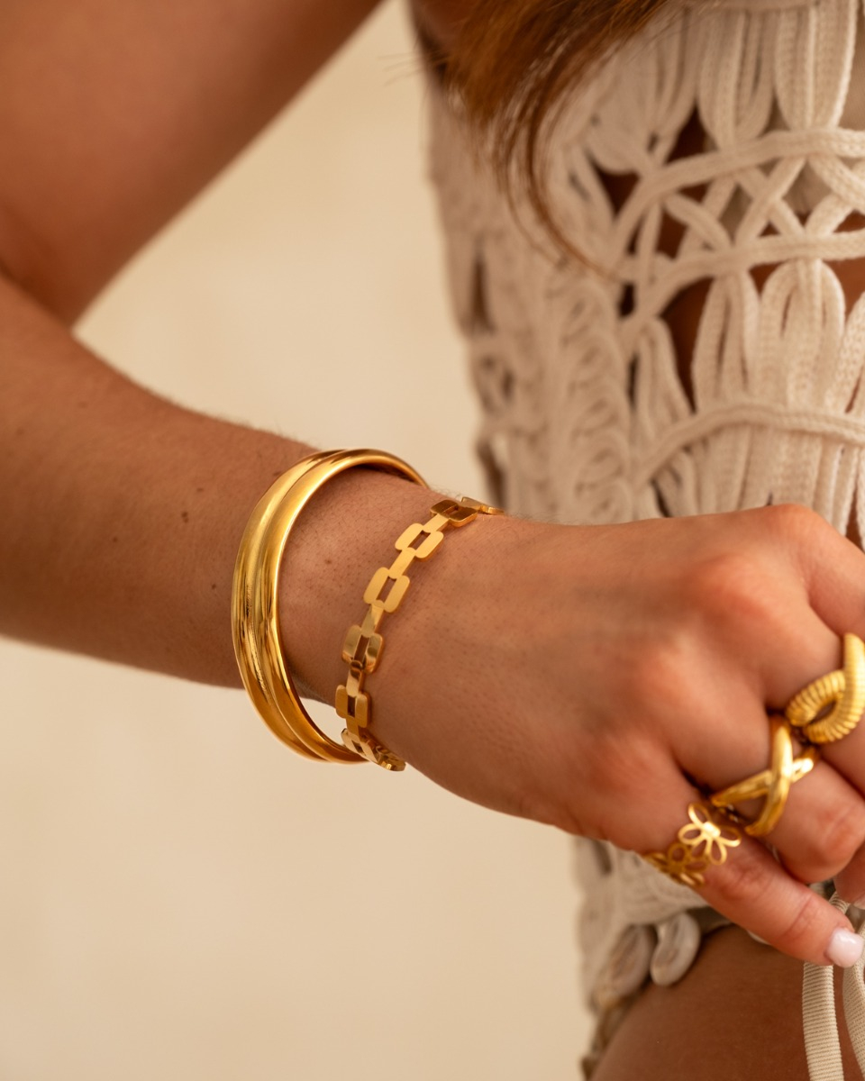 Gouden bangle armparty