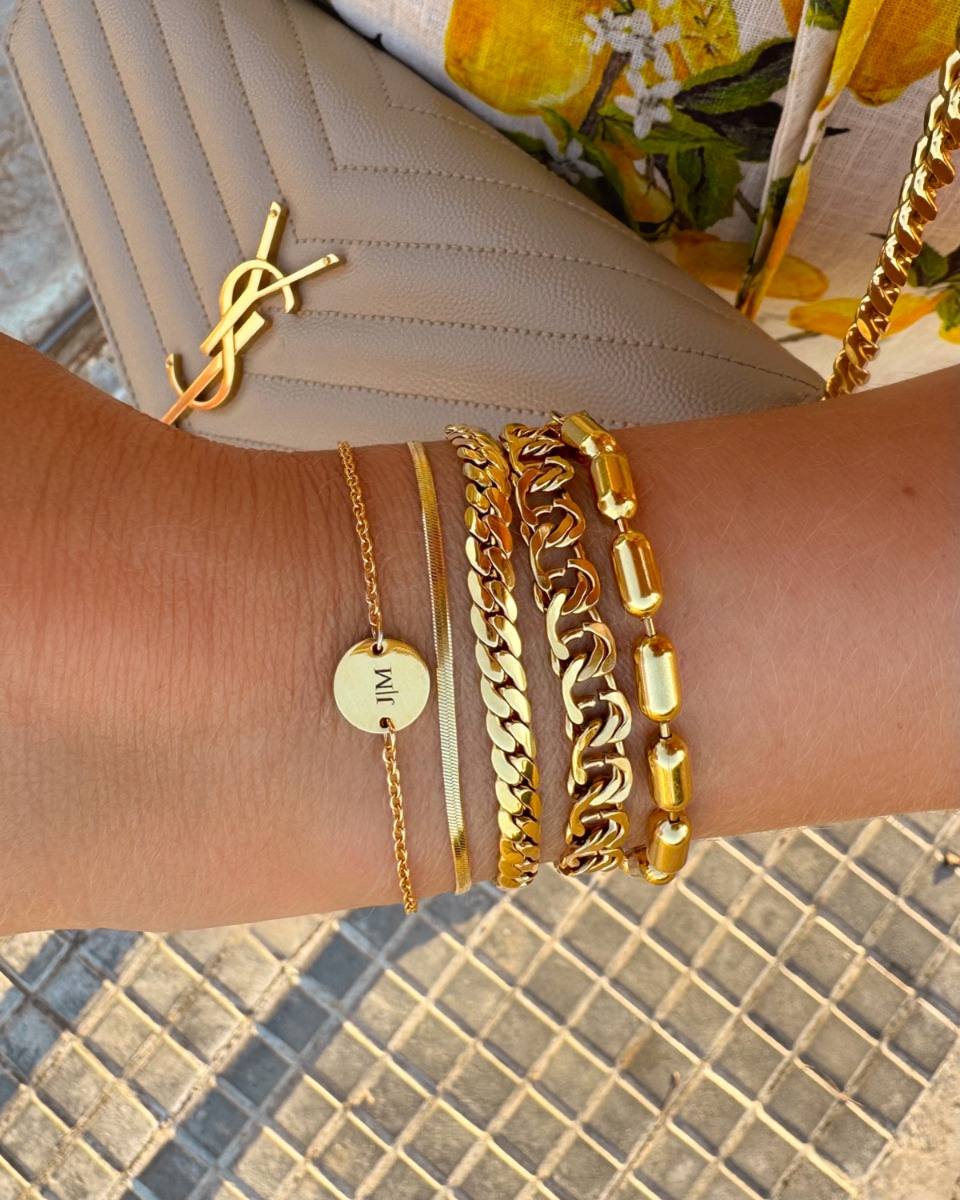 Gouden armparty met chains