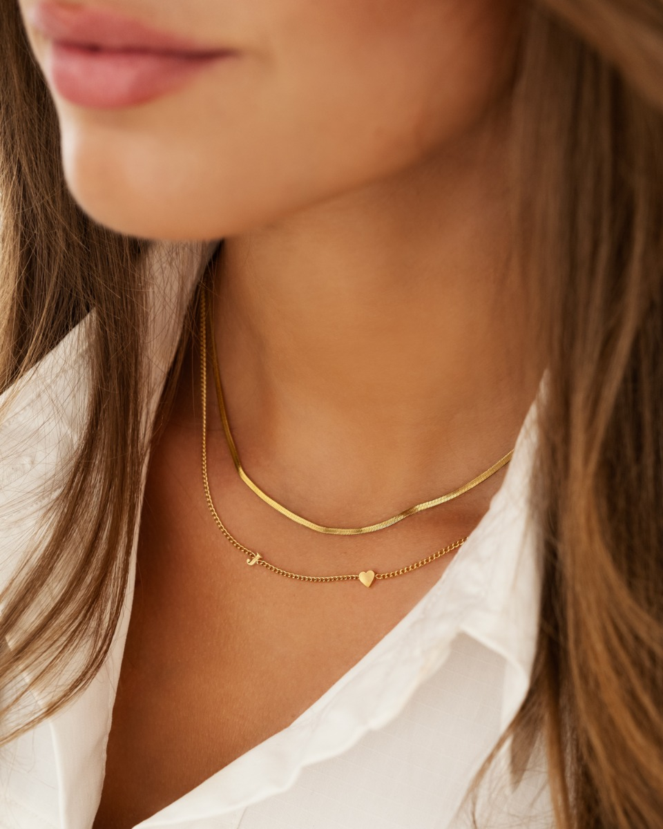 Gouden necklaceparty met initials
