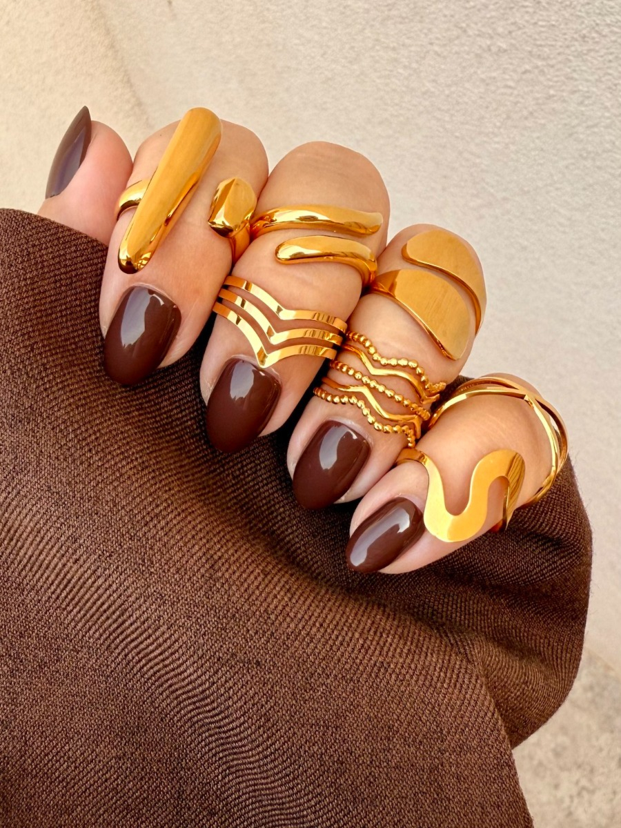 Cross-over ring goud