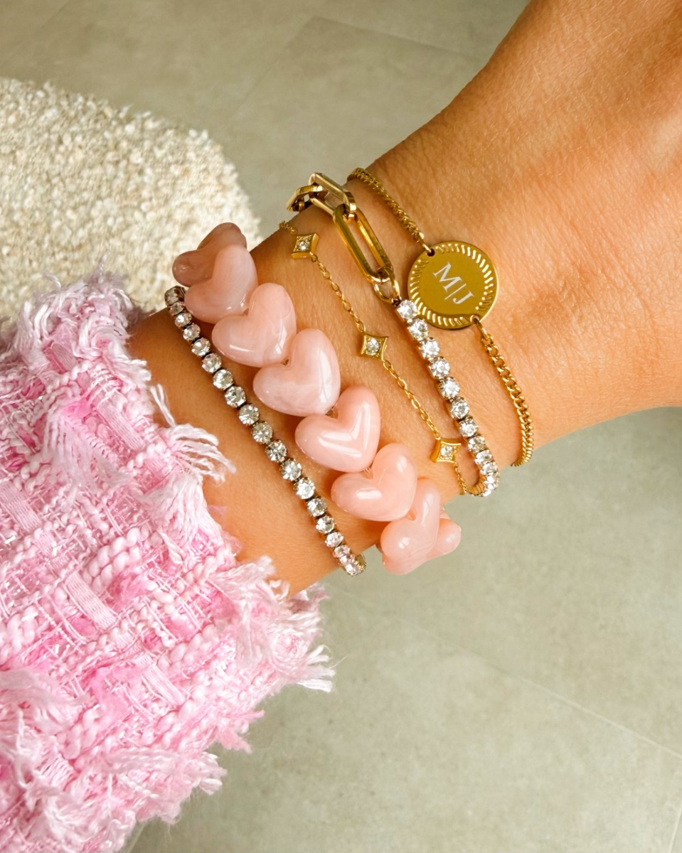 Gouden armparty met steentjes