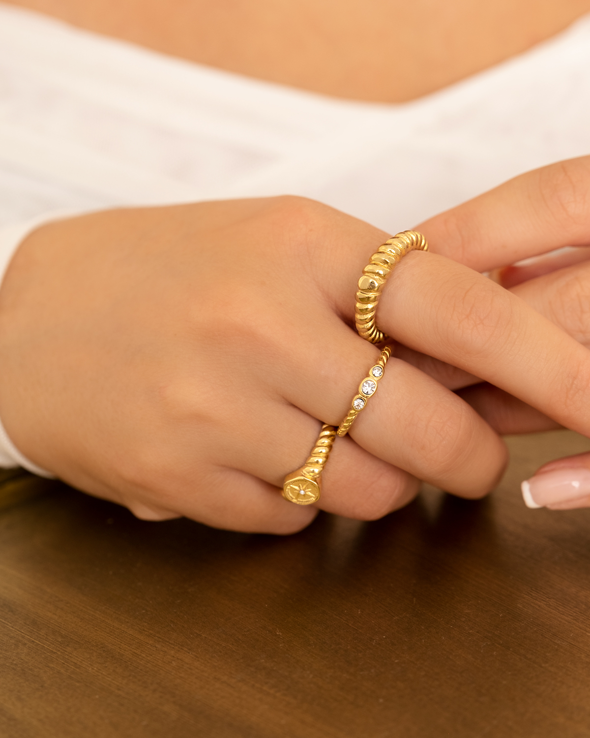 Drie gouden ringen shoppen