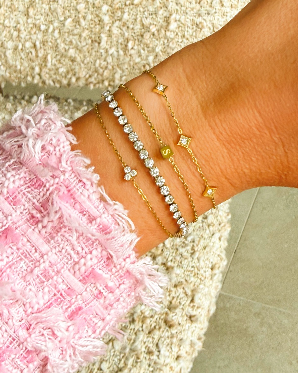 Gouden armparty met steentjes