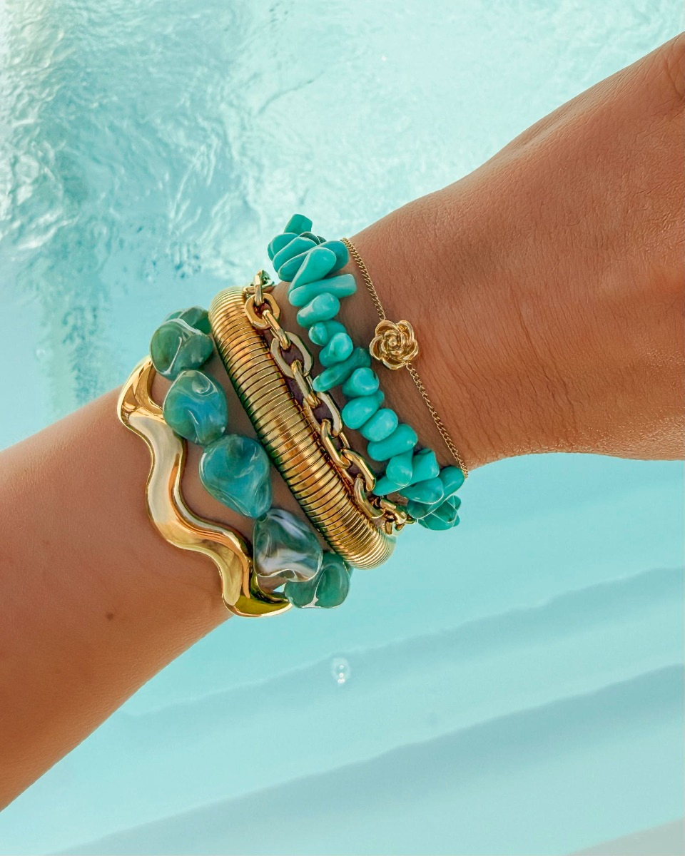 Bangle armparty goud met blauwe kralen
