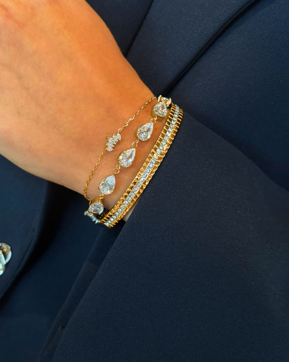 Gouden armparty met steentjes
