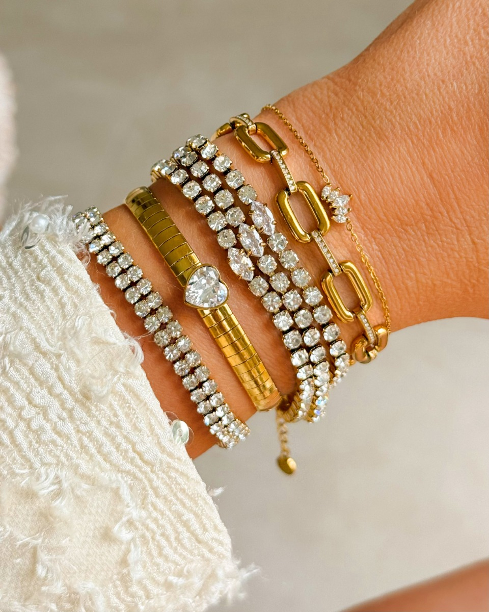 Gouden armparty met steentjes