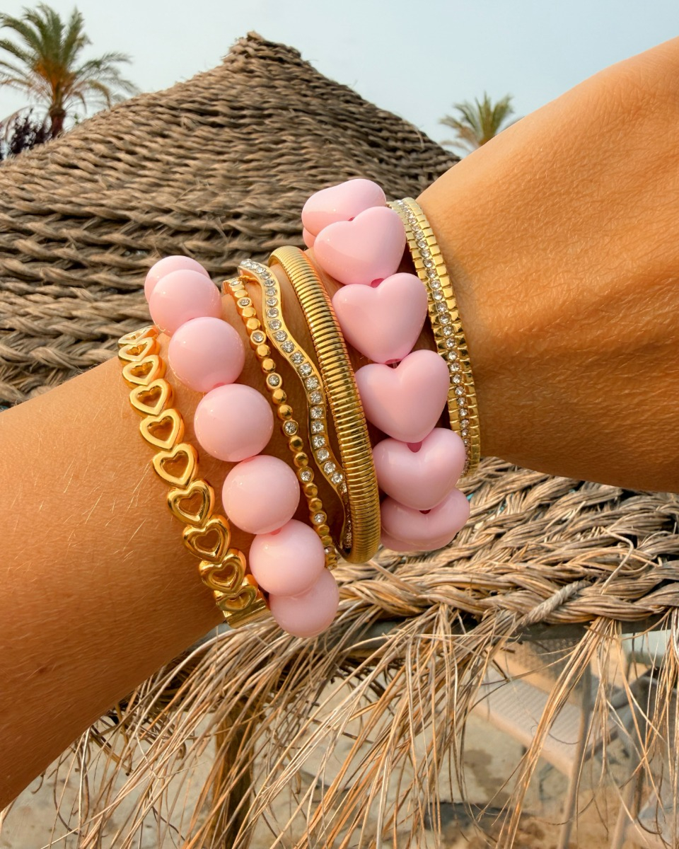 Roze bangle armparty goud