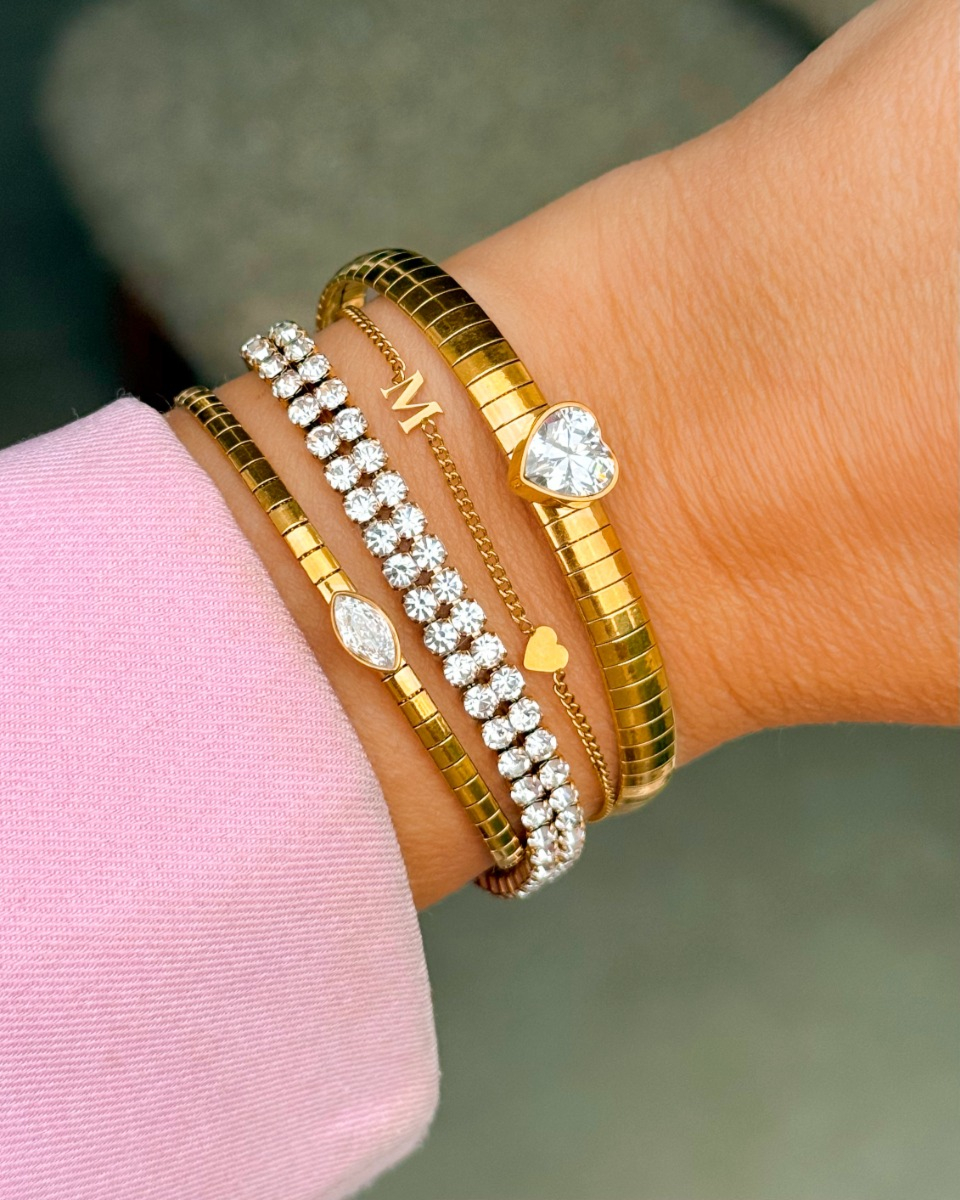 Gouden armparty shiny