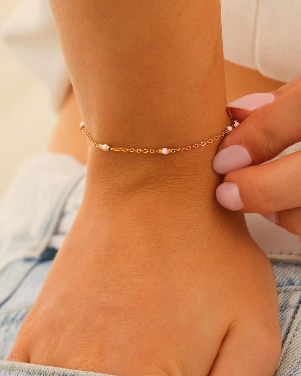Armband met witte schakels goud