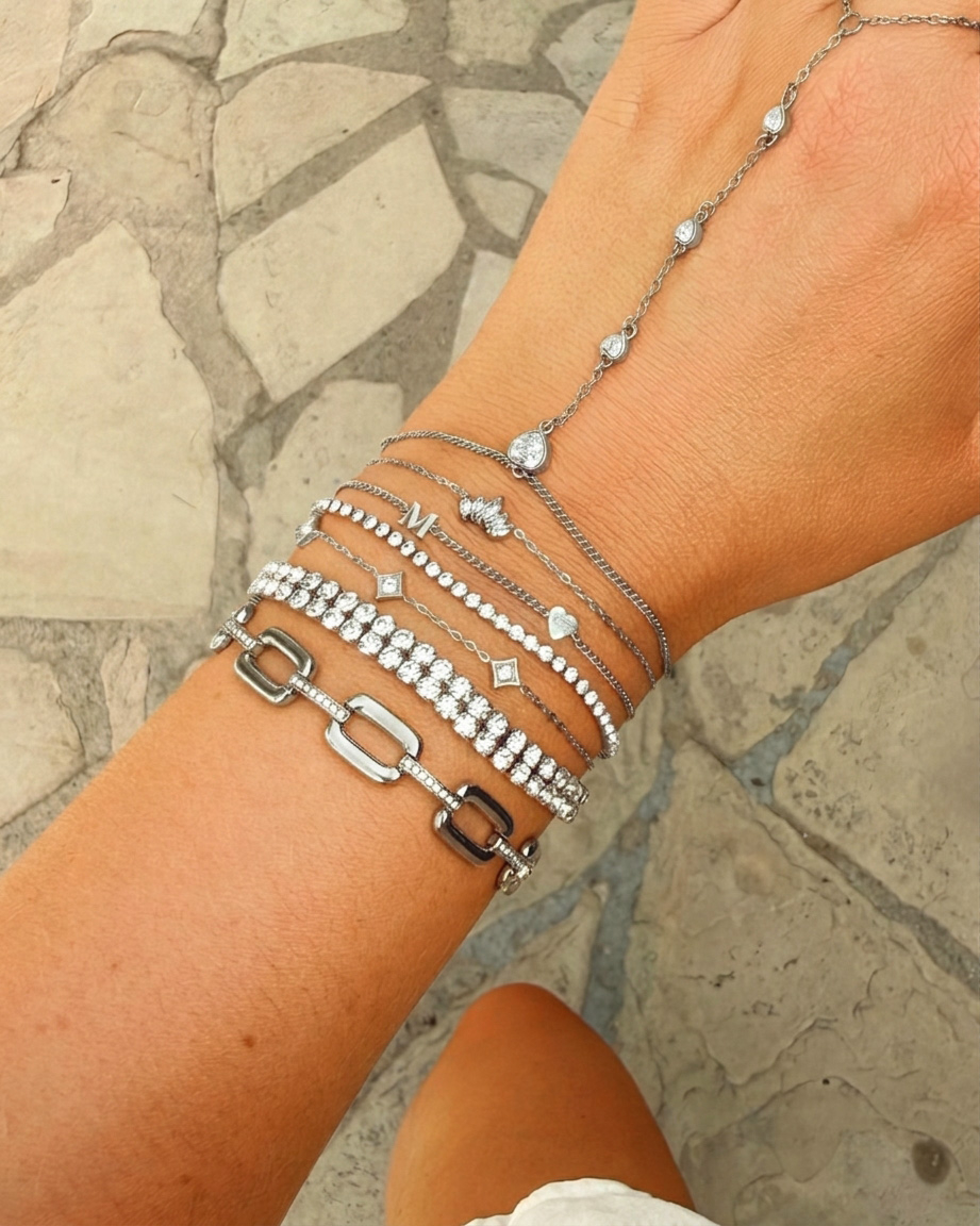 Zilveren armparty met stenen