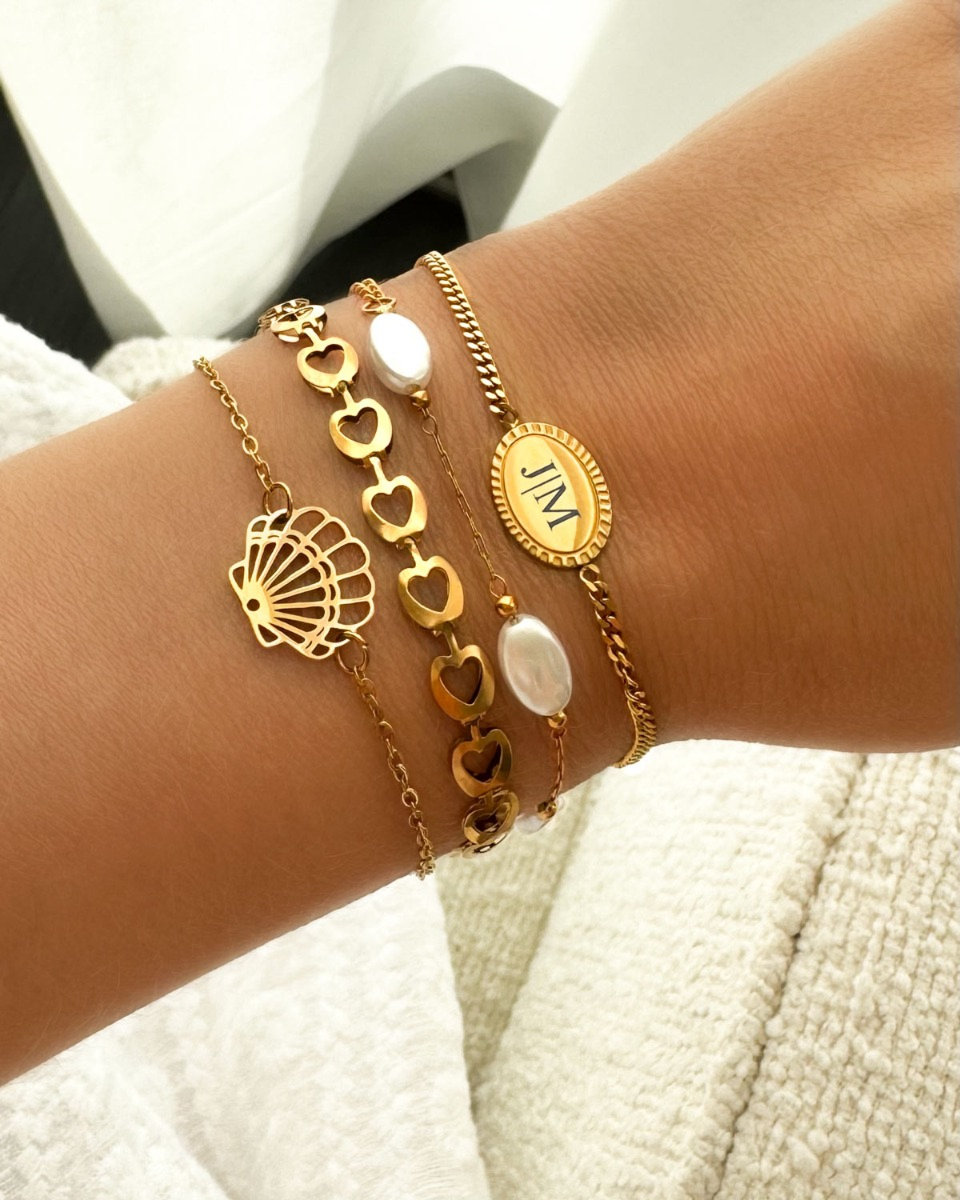 Mix van gouden armbanden