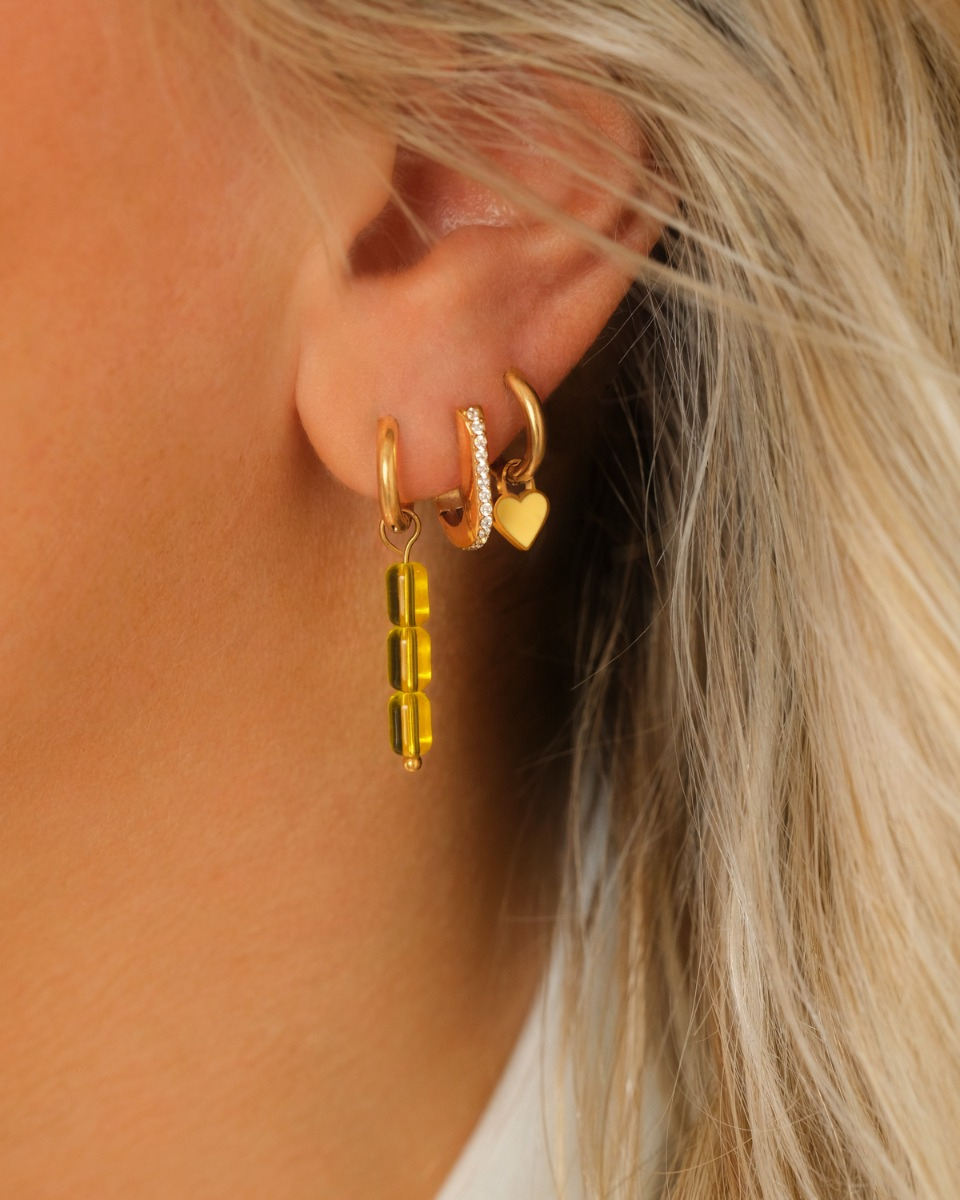 Gouden earparty met gele details