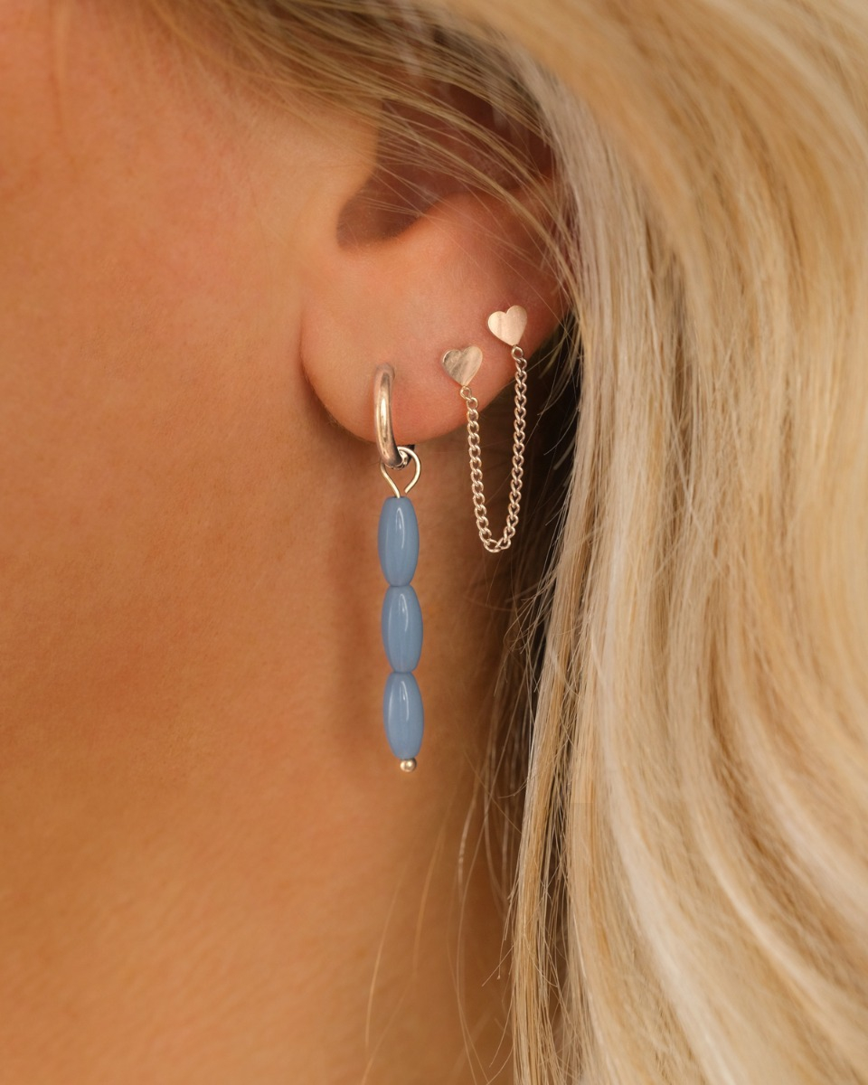 Zilveren earparty met blauwe steentjes