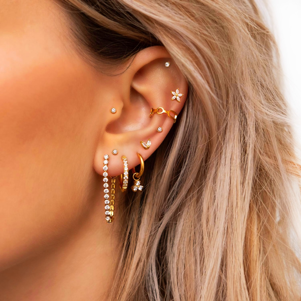 Gouden earparty met studs