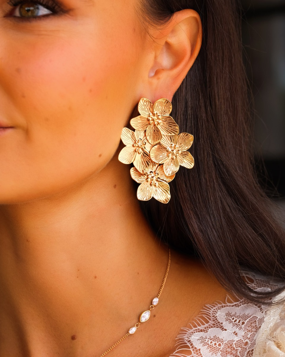 Bloemen statement oorbellen goud