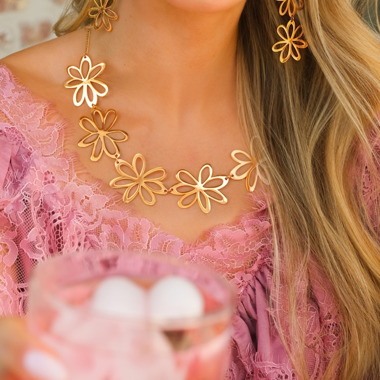 Statement flower sieraden goud