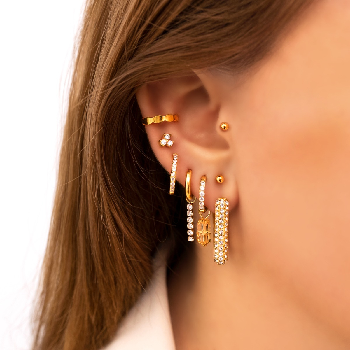 Earparty goud met steentjes