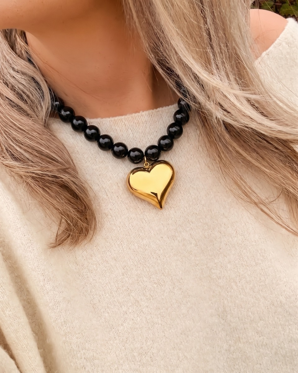 Zwarte kralen ketting met hart goudkleurig