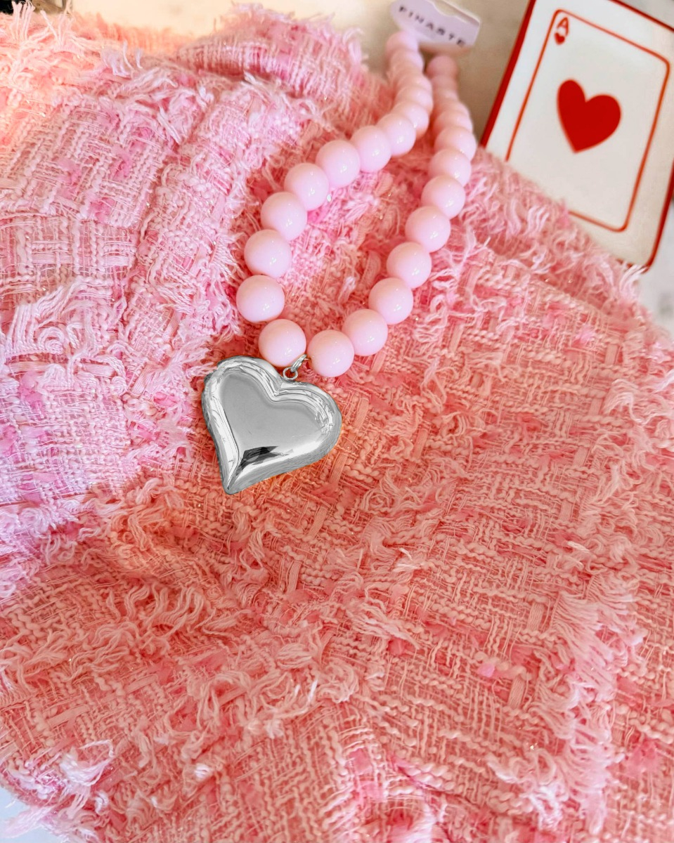 Roze kralen ketting met zilveren hart